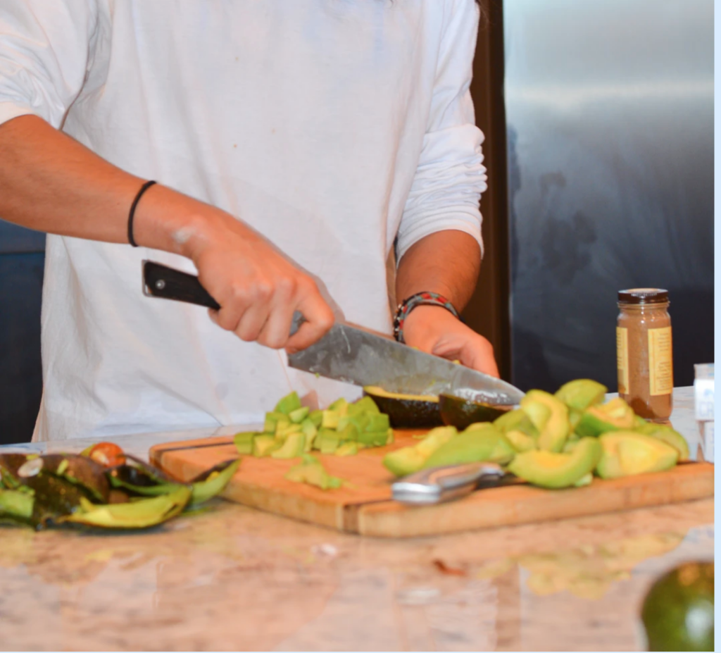 chef chopping avocado